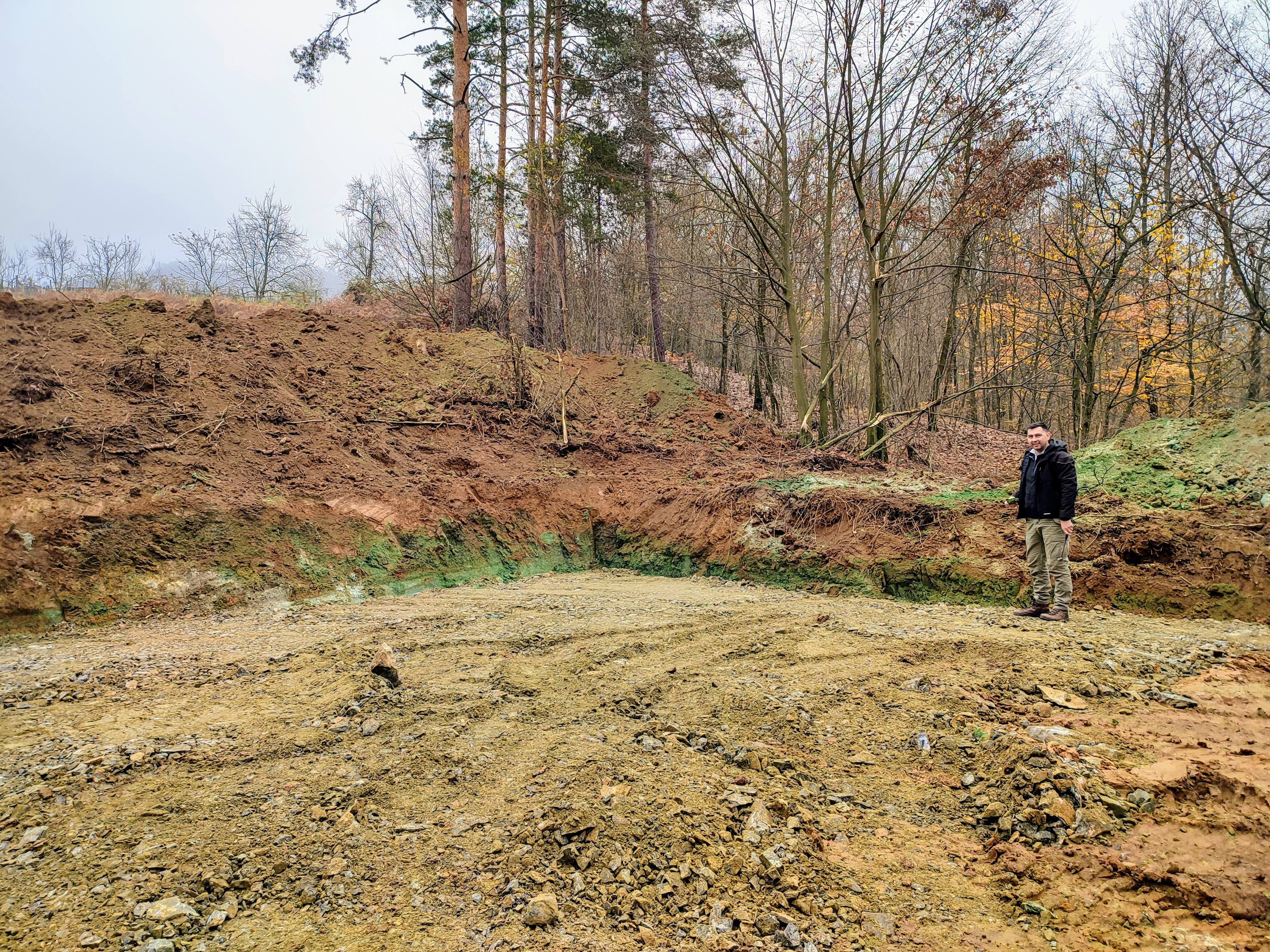 Cleared drill pad exposing massive fuchsite-altered material at the St Nicholas nickel-cobalt project near Petrovo and Doboj